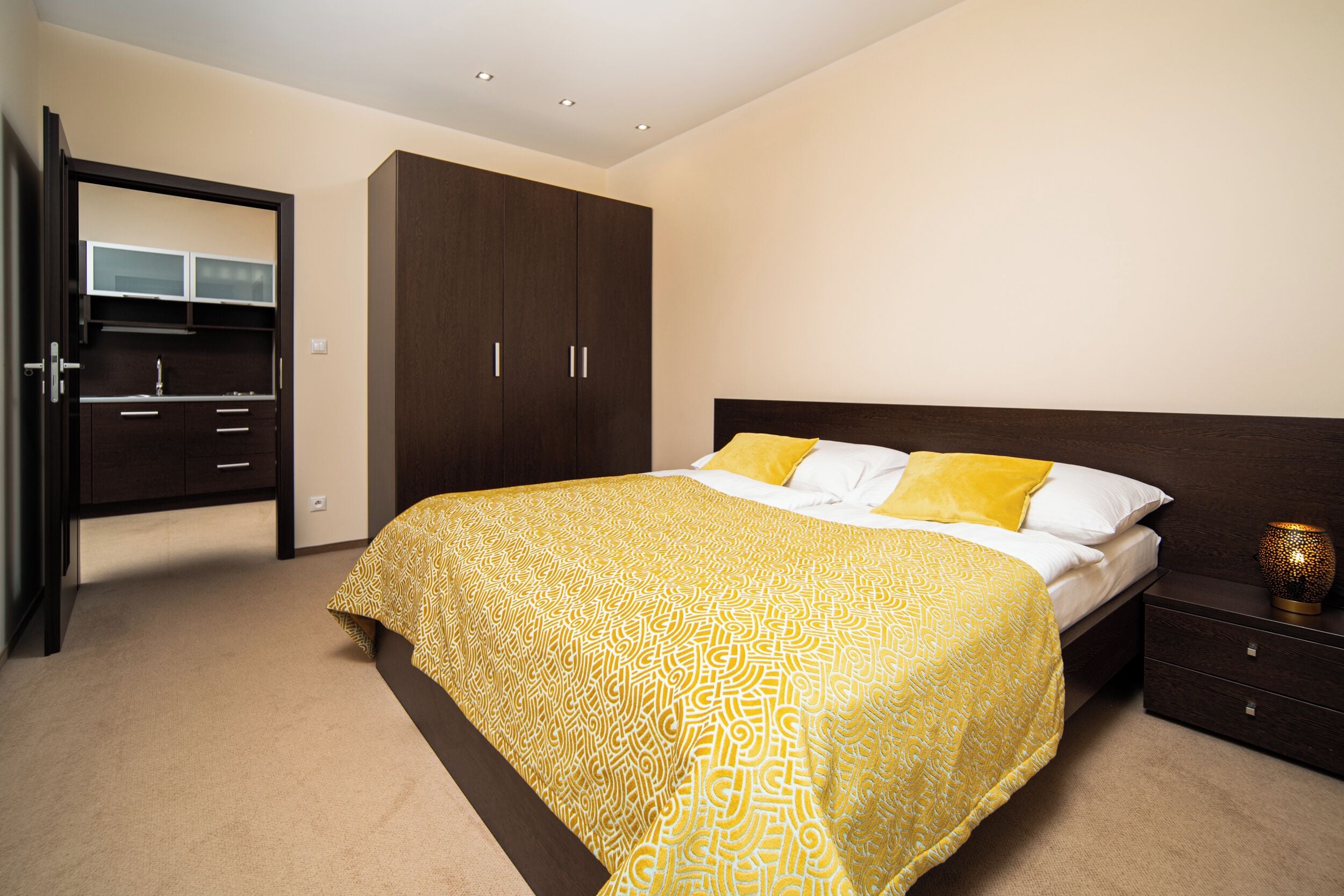 Apartment, Courtyard View | Hypo-allergenic bedding available, minibar (free items), in-room safe