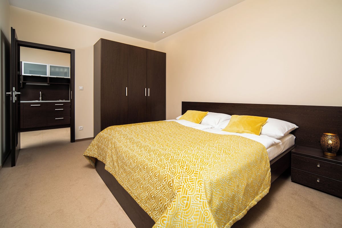 Apartment, Courtyard View | Hypo-allergenic bedding available, minibar (free items), in-room safe