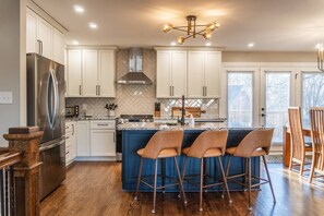 Fridge, microwave, oven, stovetop - 3BR Home Near EVERYTHING | King Beds | Game Room (Louisville)