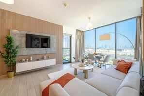 Appartement Deluxe, balcon, vue ville | Coin séjour
