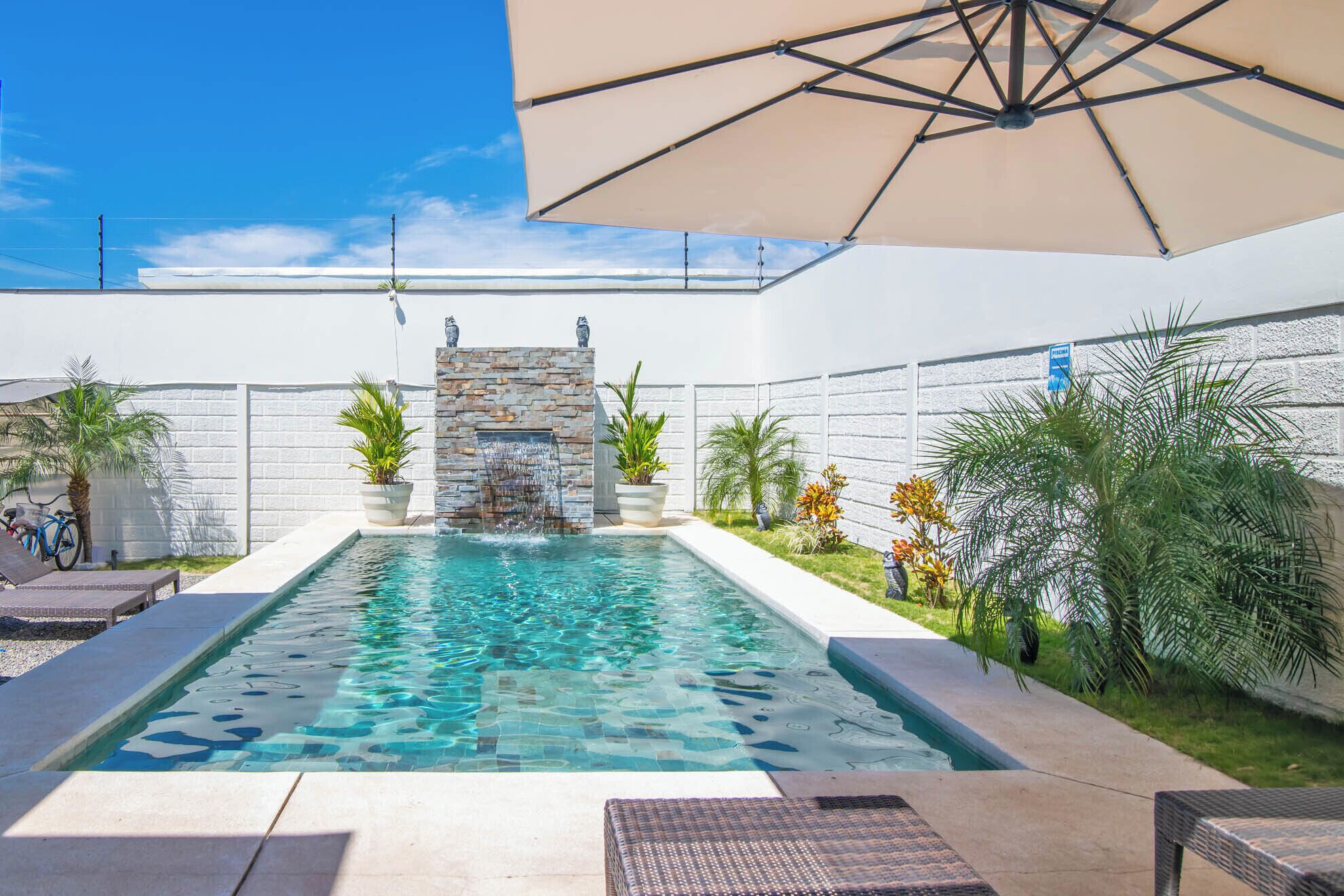 Outdoor pool, free cabanas, pool umbrellas
