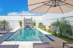 Outdoor pool, free cabanas, pool umbrellas