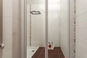 Shower, eco-friendly toiletries, hair dryer, bidet