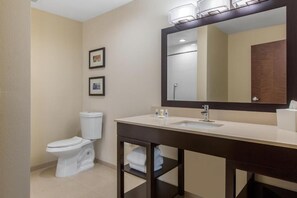Shower, hair dryer, towels, toilet paper