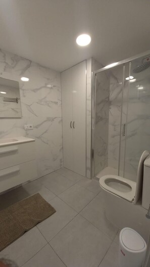 Ducha, secador de pelo