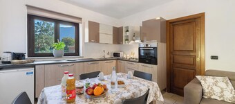Apartment 'Casa Vacanze Villatanya - Cir 0014' with Mountain View, Shared Garden and Wi-Fi