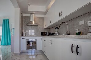 Microwave, oven, coffee/tea maker, toaster