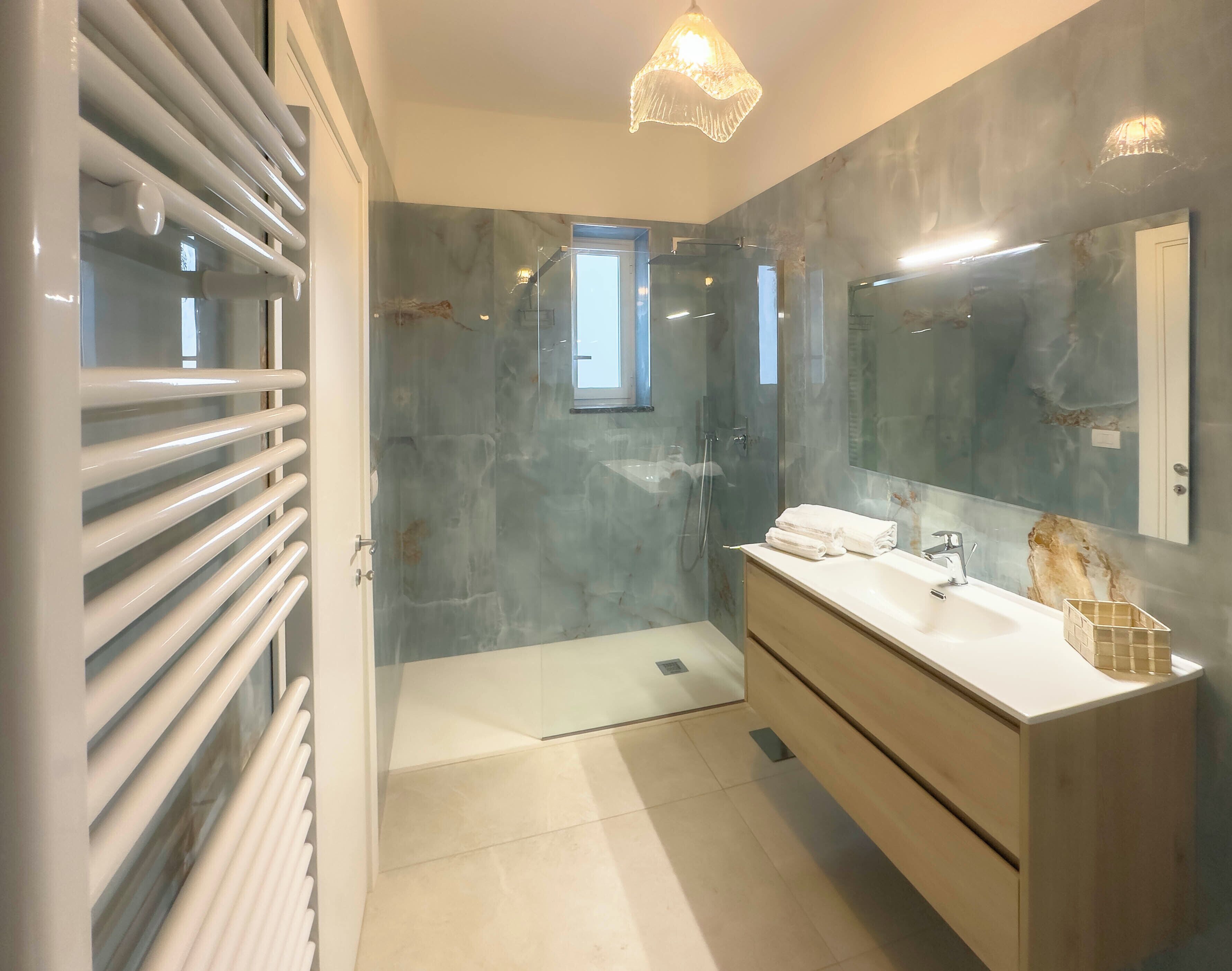 Hair dryer, bidet, towels, soap