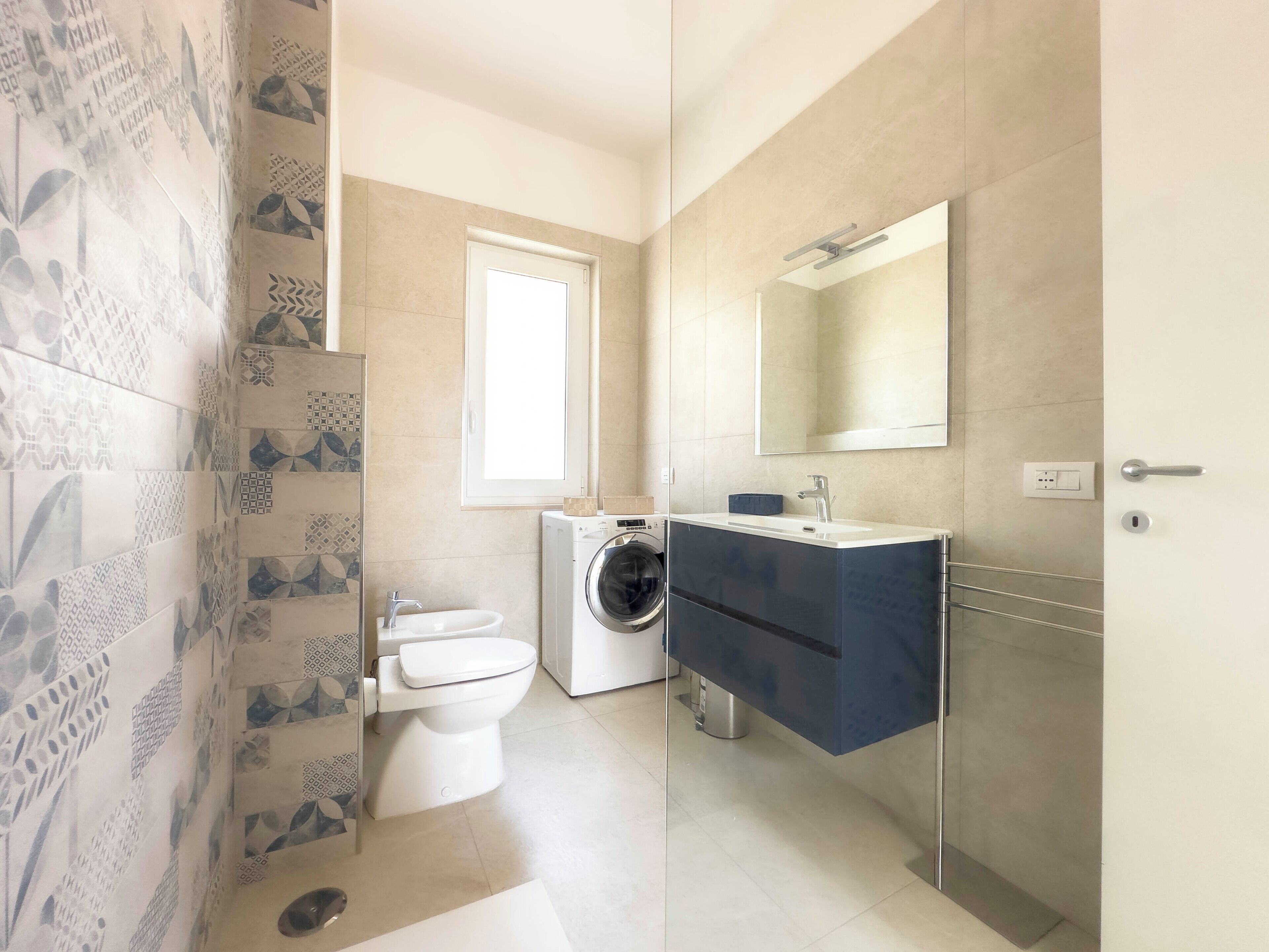 Hair dryer, bidet, towels, soap