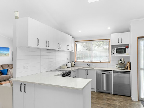 Fridge, microwave, dishwasher, coffee/tea maker