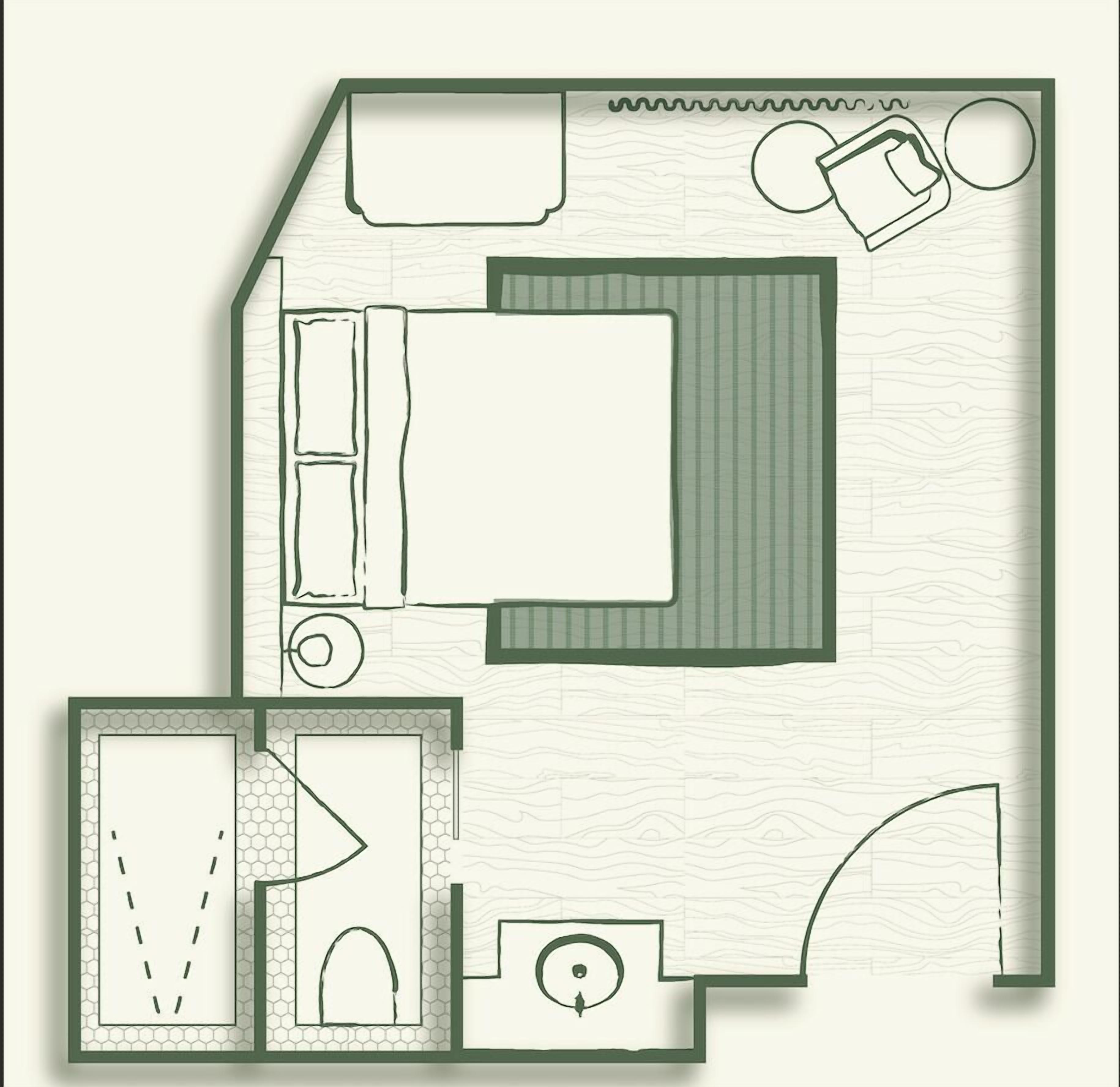 A floor plan of a hotel room with a bed, a desk, a chair, a wardrobe, and a bathroom.
