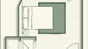 A floor plan of a hotel room with a bed, a desk, a chair, a wardrobe, and a bathroom.
