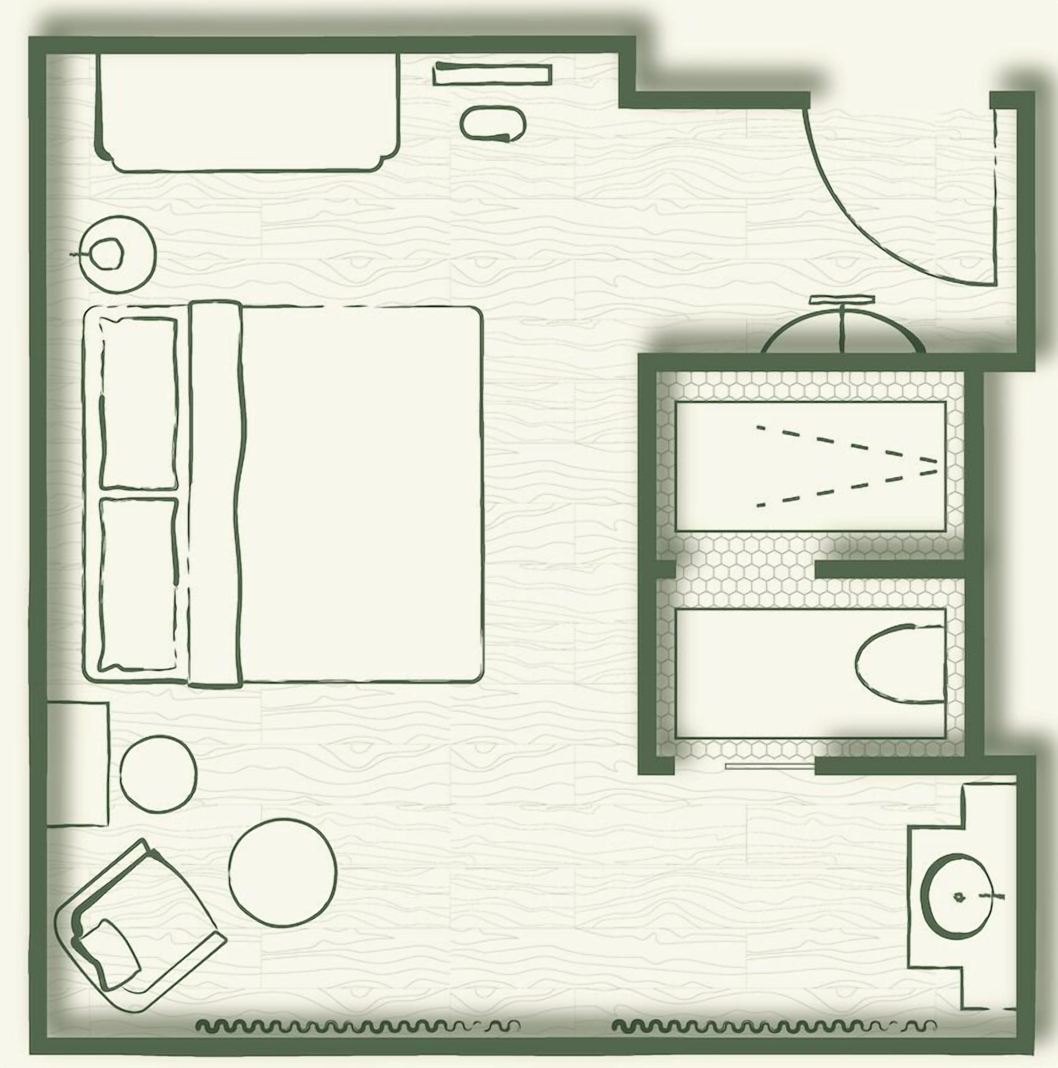 A hotel room layout with a bed, a desk, a bathroom, and a small seating area.