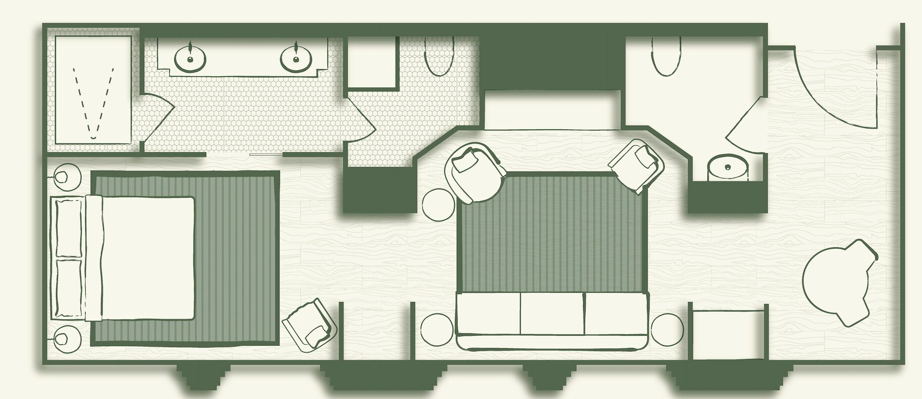 A hotel floor plan with a central living area, a separate bedroom, a bathroom, and a kitchen.