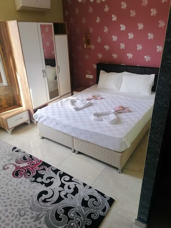 1 habitación, tabla de planchar con plancha y wifi gratis