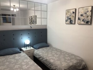 2 bedrooms, iron/ironing board, WiFi, bed sheets