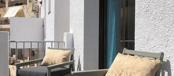 Lovely two bedroom villa.  South facing sunny private terrace. Very accessible