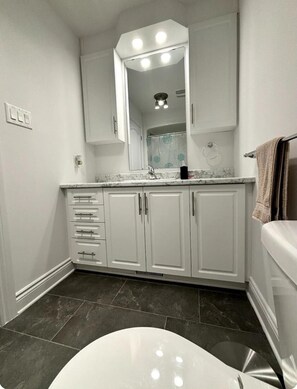 Shower, towels, soap, shampoo