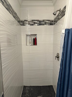 Shower, towels, soap, shampoo