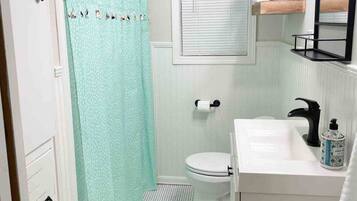 Hair dryer, towels, soap, shampoo