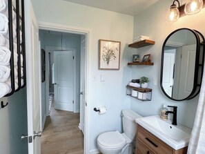 Shower, hair dryer, towels