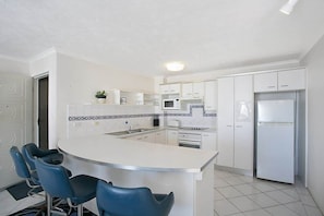 Fridge, toaster, cookware/dishes/utensils