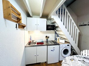 Fridge, toaster, cookware/dishes/utensils