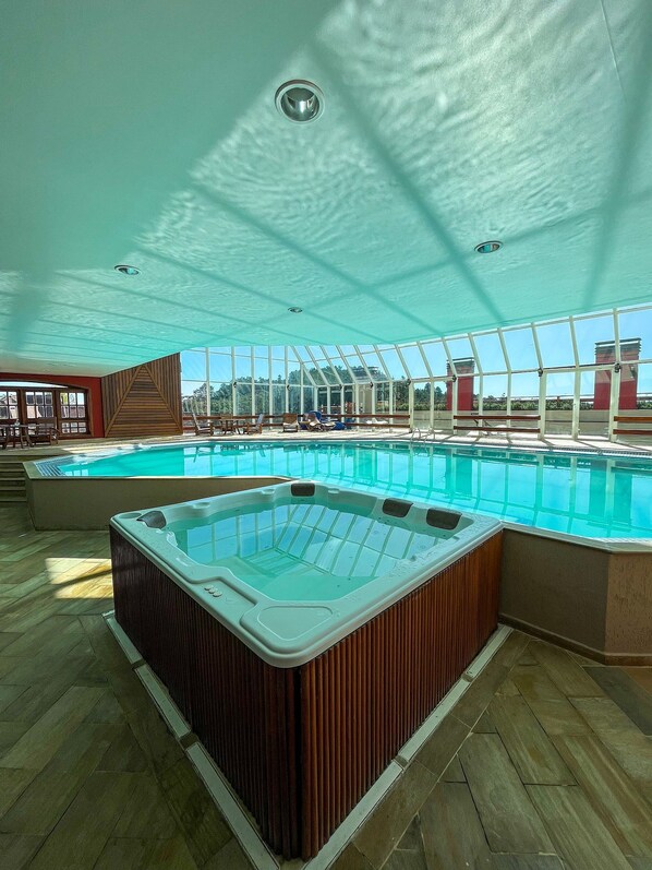 Basic Apartment | Pool | Indoor pool, open 10:00 AM to 8:00 PM, sun loungers