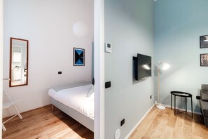 1 slaapkamer, een strijkplank/strijkijzer, wifi, beddengoed