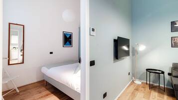 1 habitación, tabla de planchar con plancha, wifi y ropa de cama