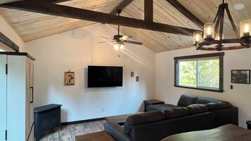 Smart TV, fireplace, foosball, books