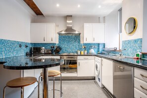Fridge, microwave, dishwasher, coffee/tea maker