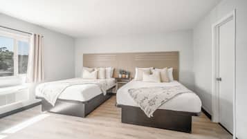 Deluxe Room, 2 Queen Beds, Non Smoking | Free WiFi, bed sheets