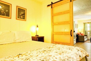 1 bedroom, desk, iron/ironing board, travel crib