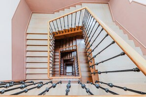 Stairs lead to a view from the upper level.