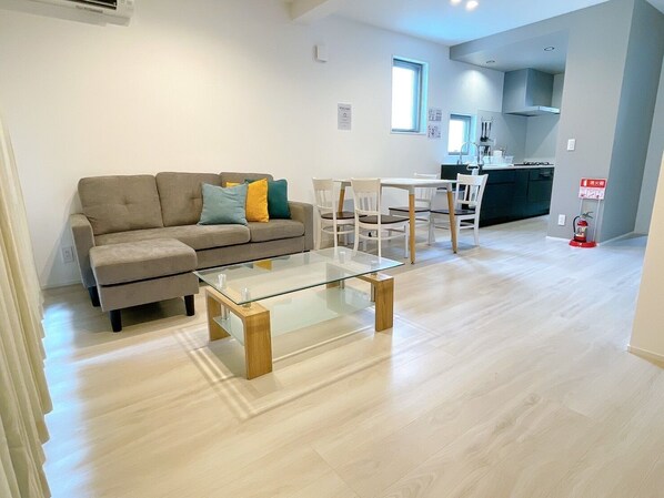 House, Partial Ocean View | Living area | Flat-screen TV