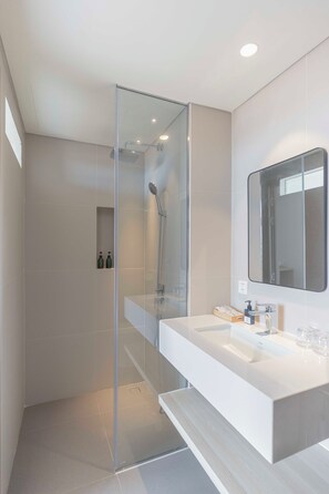 Deluxe Double Room, Ocean View | Bathroom | Shower, eco-friendly toiletries, hair dryer, towels