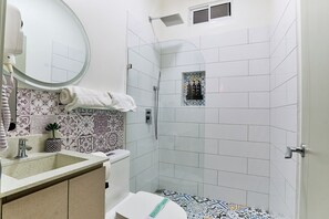 Hair dryer, towels, soap, shampoo