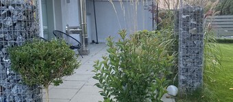 Holiday Home 'Fancy Bungalow Rand Hamburg' with Private Terrace, Shared Garden and Wi-Fi