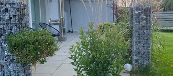 Holiday Home 'Fancy Bungalow Rand Hamburg' with Private Terrace, Shared Garden and Wi-Fi