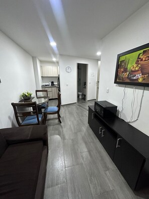 Family Apartment, 1 Queen Bed with Sofa bed, Private Bathroom, Ground Floor | Living area | Flat-screen TV - Apartamentos Norte de Armenia (Armenia)