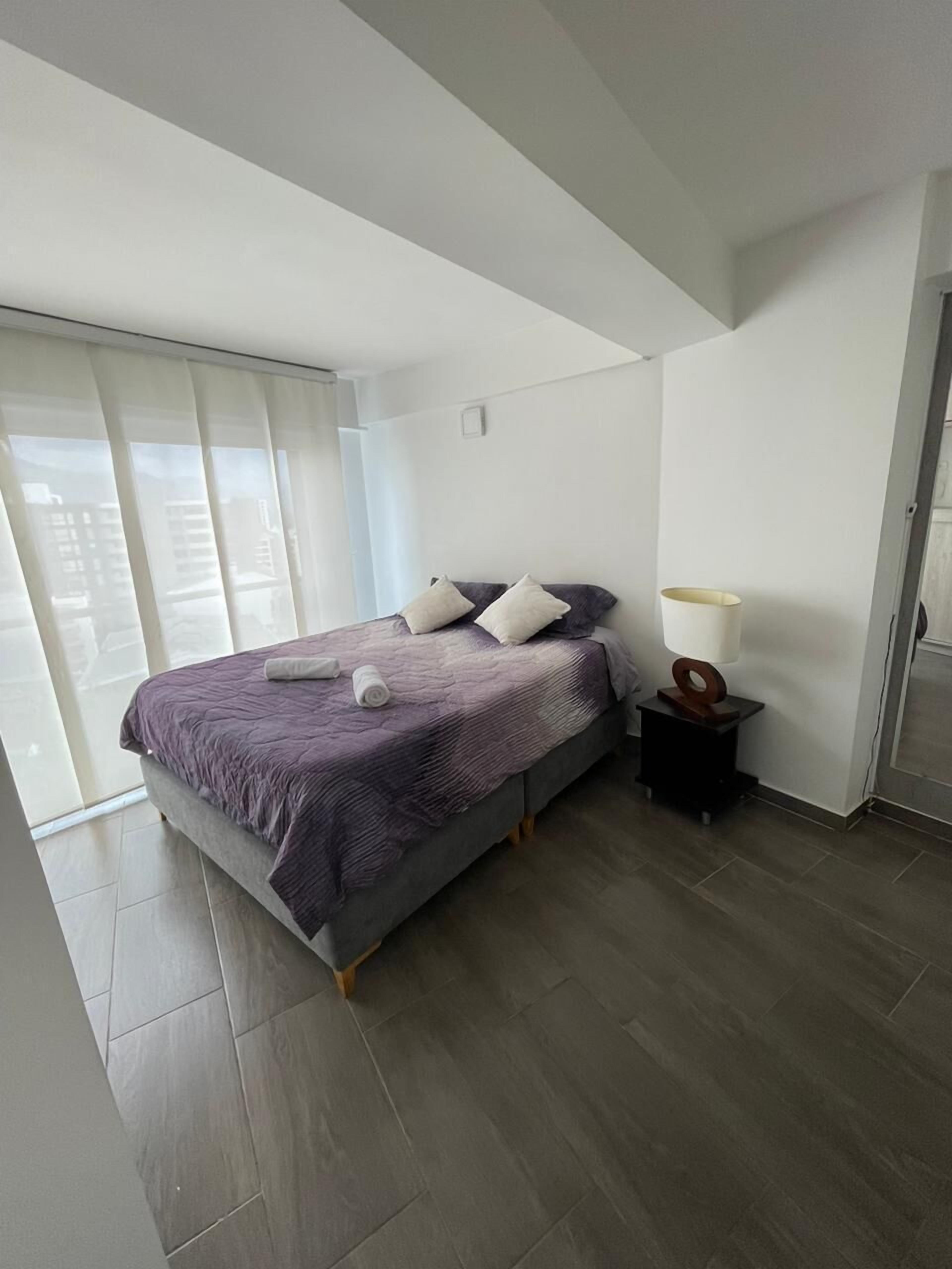 Panoramic Apartment, 2 Bedrooms, City View, Tower | Desk, laptop workspace, blackout curtains, soundproofing