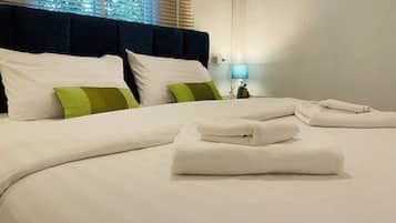 Family Room, Garden View | In-room safe, blackout curtains, iron/ironing board, free WiFi