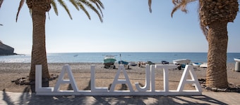 Vacation Apartment 'La Lajita Beach House' with Sea View, Private Terrace and Wi-Fi