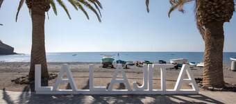 Vacation Apartment 'La Lajita Beach House' with Sea View, Private Terrace and Wi-Fi