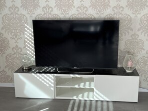 Classic Apartment | Living area | Flat-screen TV