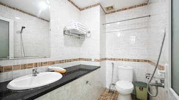 Family Room | Bathroom | Shower, hair dryer, slippers, towels