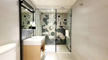 Shower, rainfall showerhead, hair dryer, towels