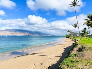 On the beach, sun-loungers, beach towels
