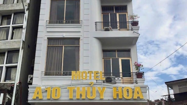 A multi-story building with a sign reading "Motel A10 THUY HOA". - A10 Thuy Hoa Hotel LC  - by BAY LUXURY (Lao Cai)